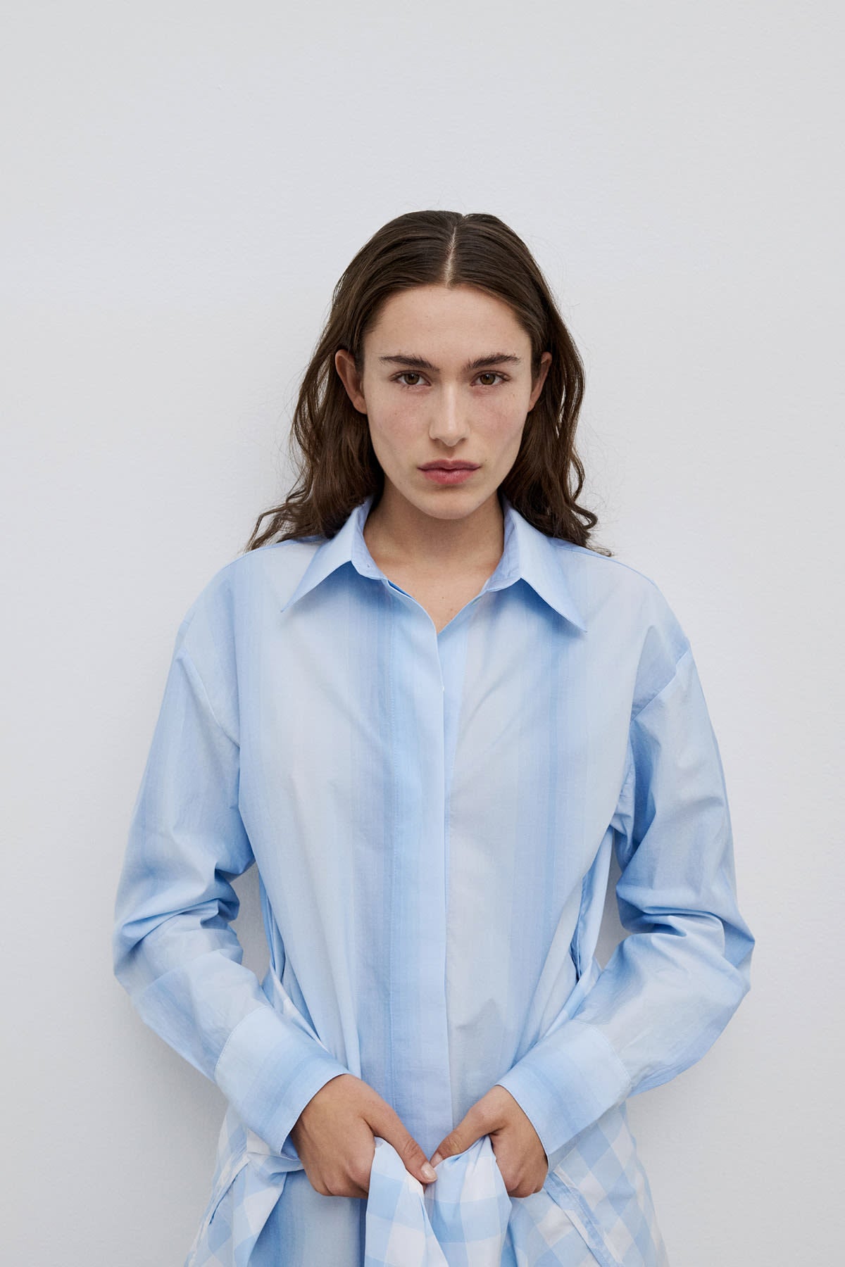 Model styling Vega classic cotton shirt, a refined blue striped cotton shirt for everyday elegance