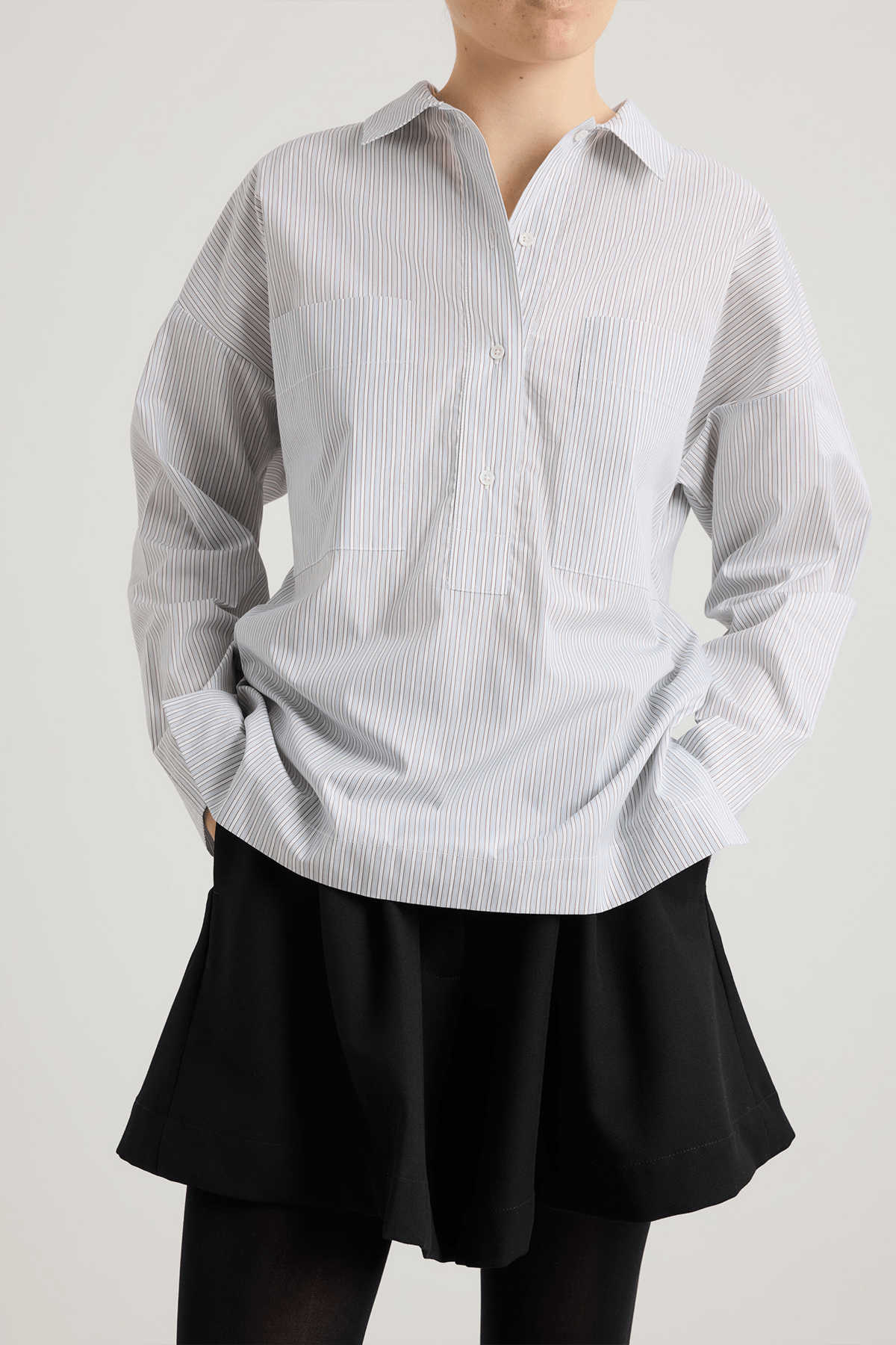 white striped shirt with big pockets