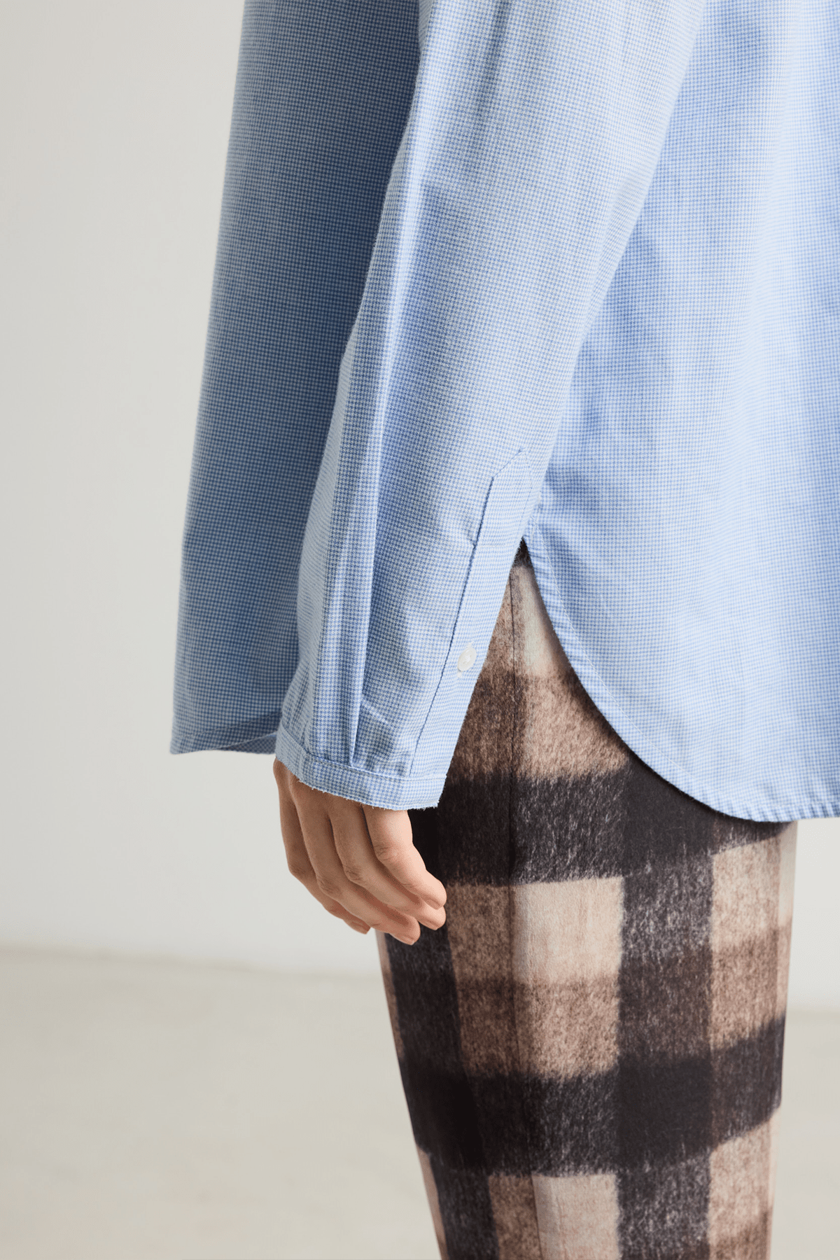 close up blue houndstooth button down shirt