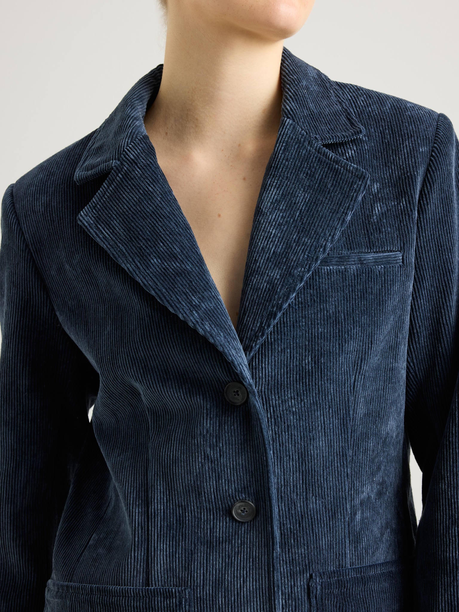 girl in navy curduroy jacket
