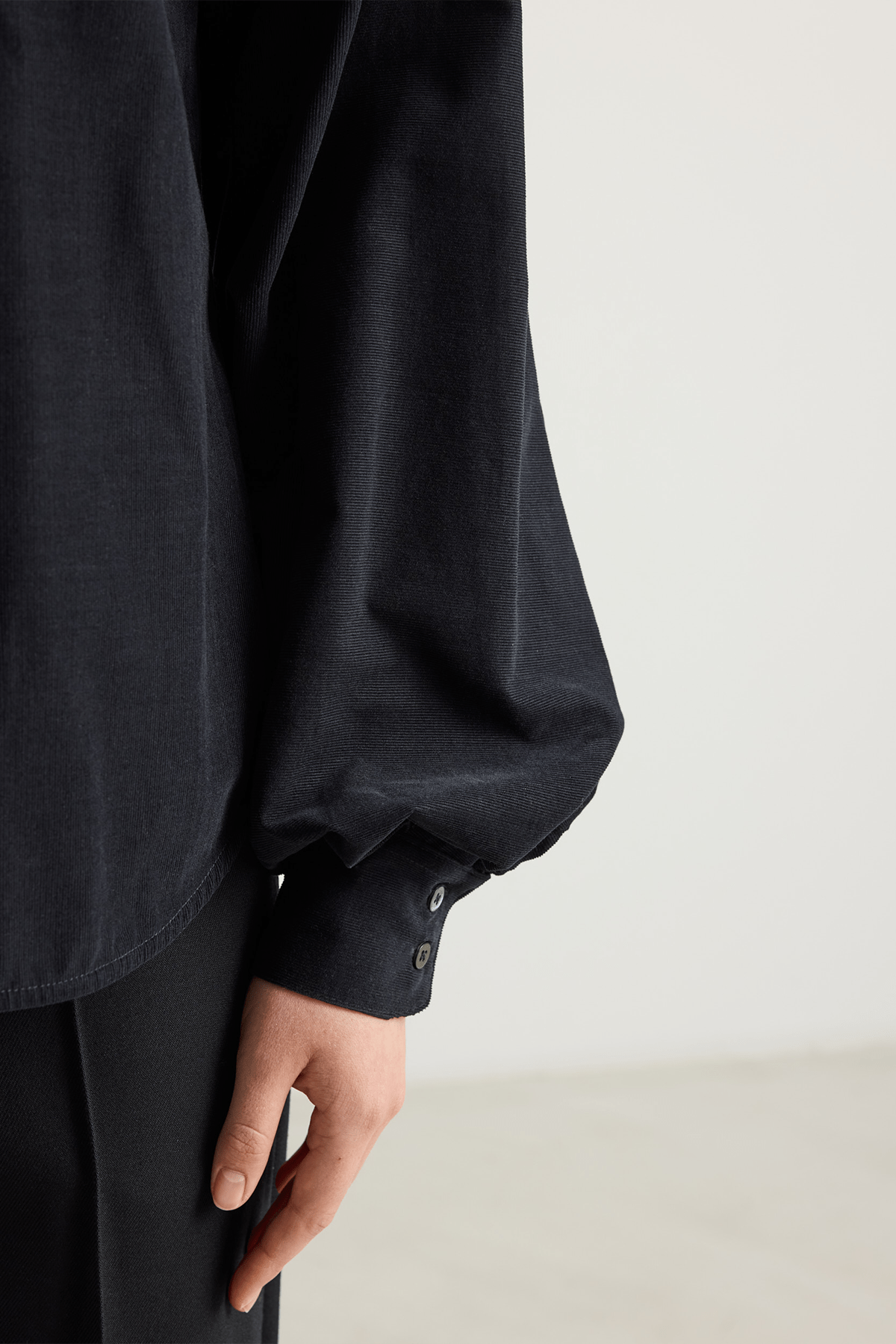 black shirt big sleeves