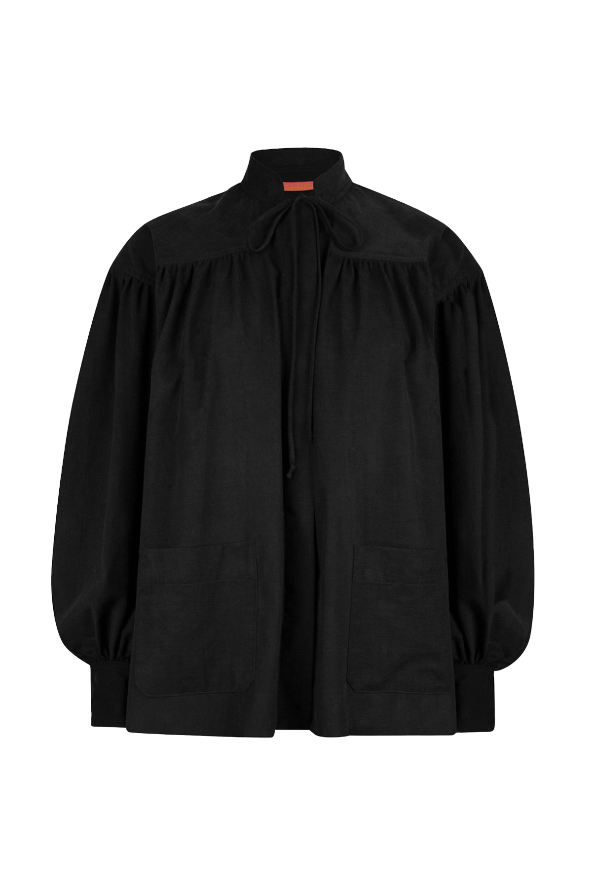 black checked shirt with a tie-neck detail, front button closure, and long voluminous balloon sleeves gathered at the wrists.