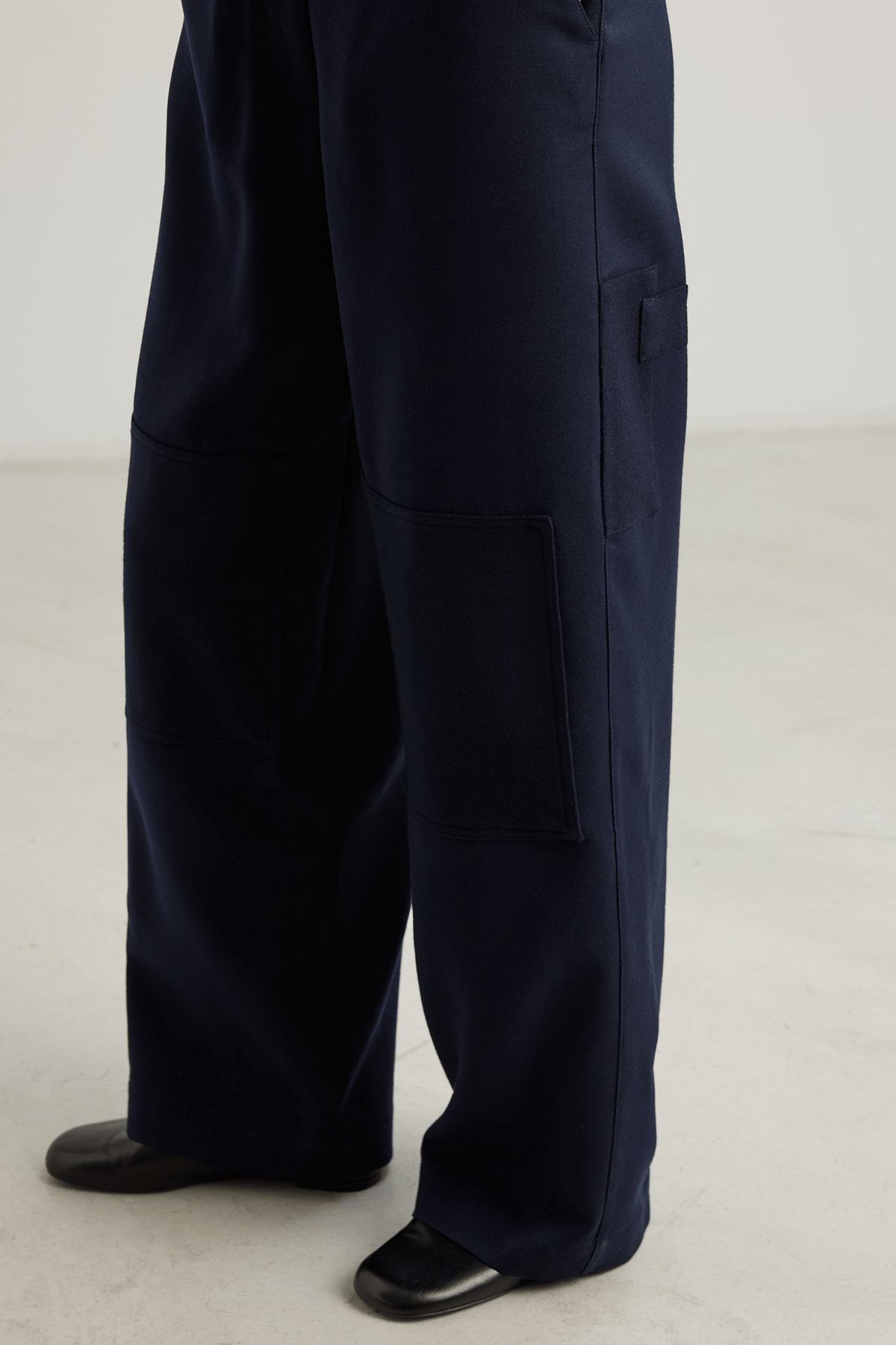 close up Navy straigt leg trousers
