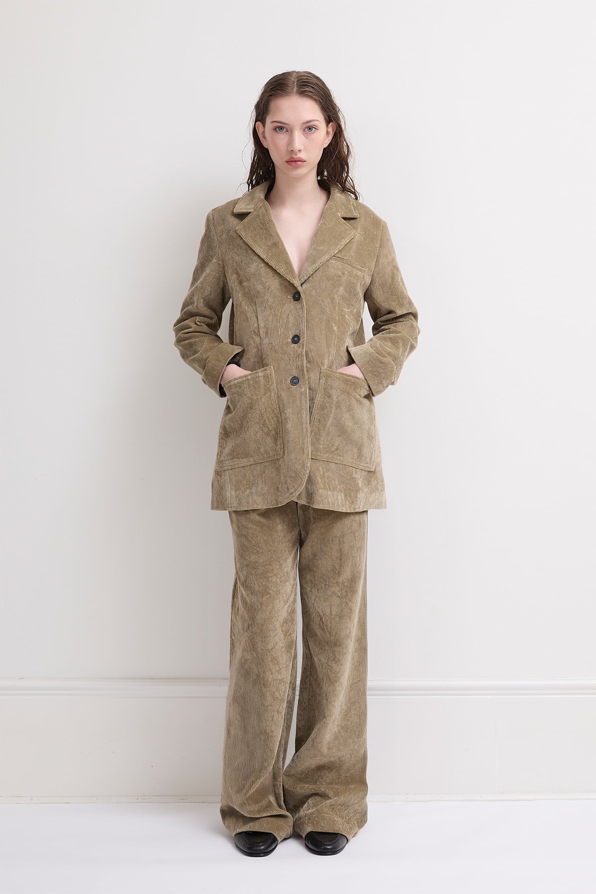 girl in Sand curduroy jacket and matching trousers