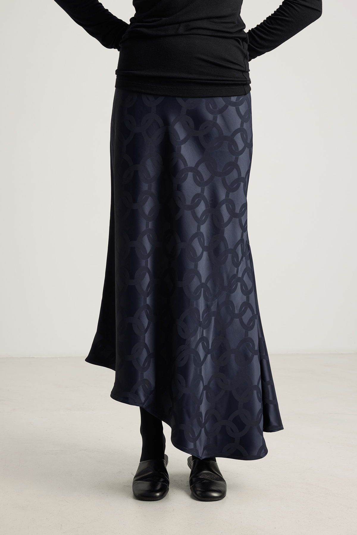 girl in black asymmetrical skirt