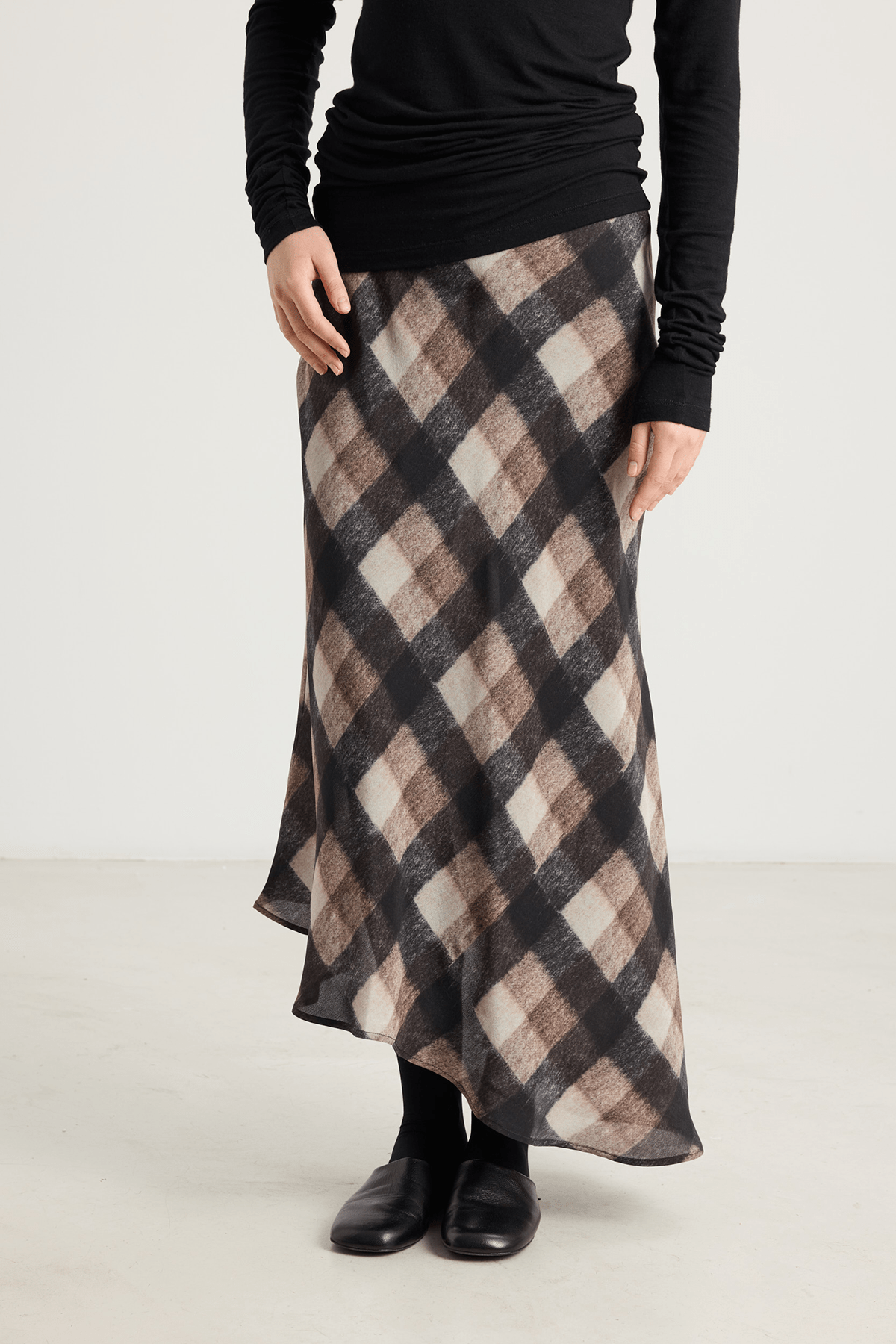 girl in brown check skirt