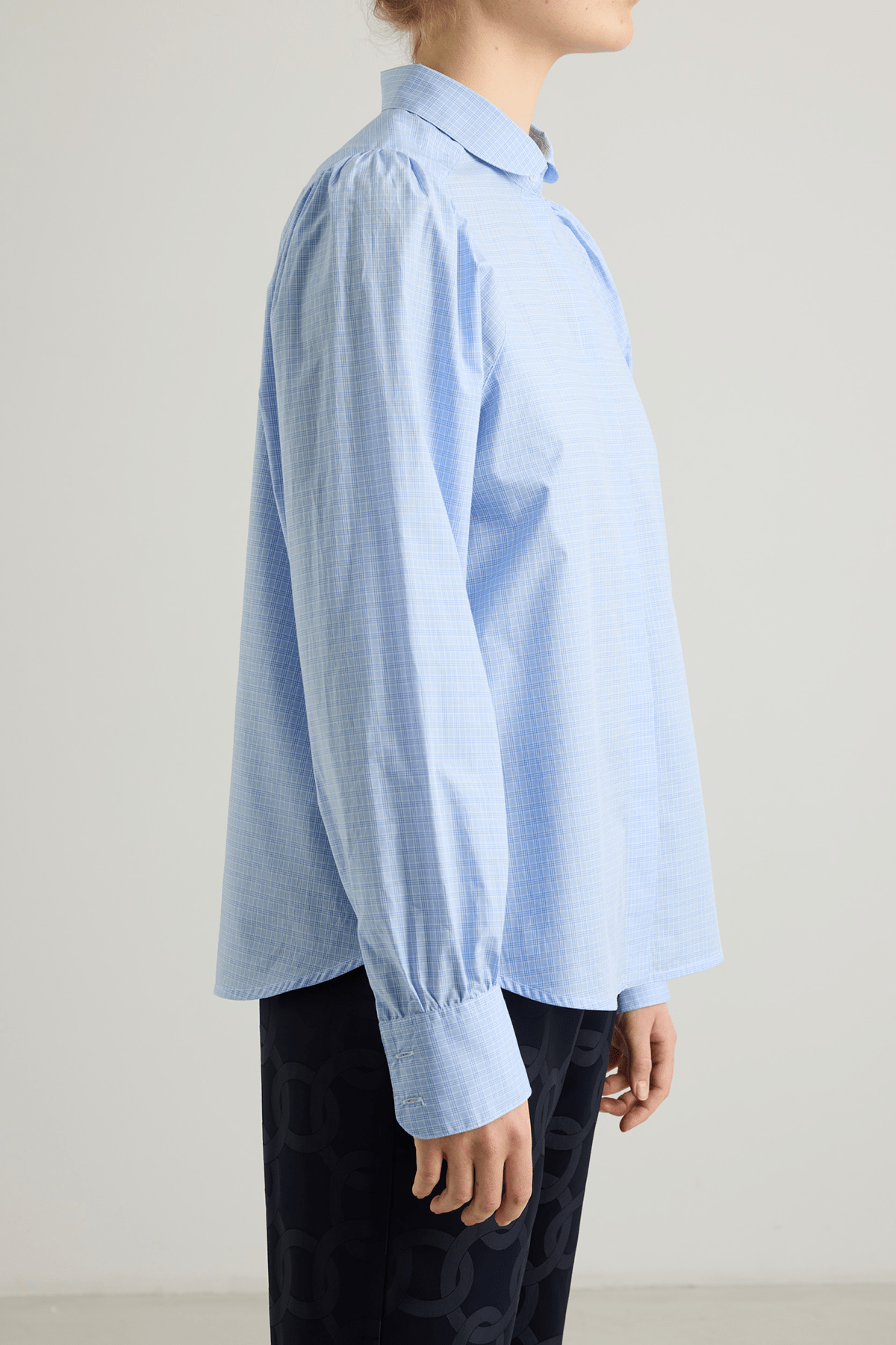 girl in blue check cotton shirt
