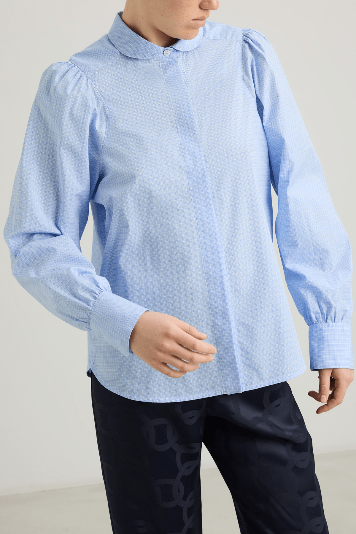girl in blue check cotton shirt
