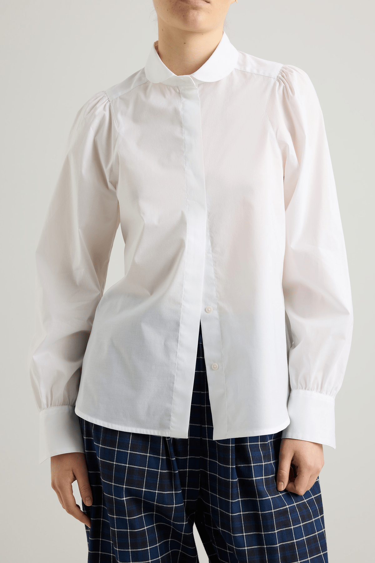 girl in white cotton button down shirt