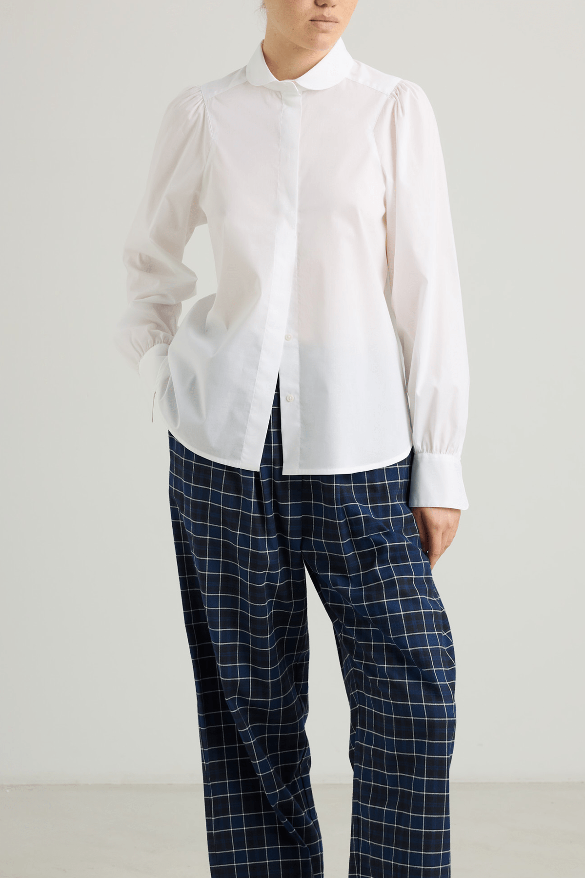 girl in white cotton button down shirt