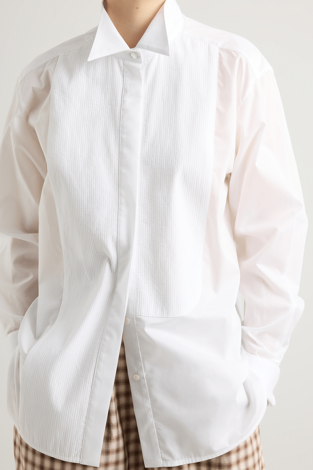 girl in white tuxedo shirt